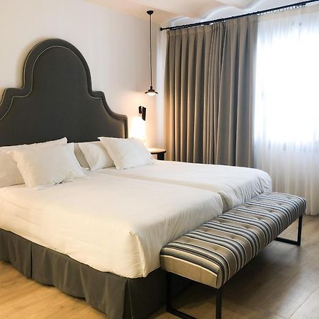 Suites Hom Sevilla Bagian luar foto